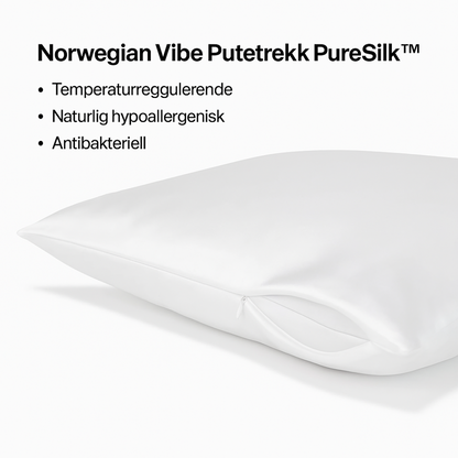 Nærbilde av hvitt silkeputetrekk – luksuriøs glatt finish og sølvioner som beskytter hud og hår